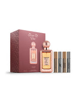 lattafa queen of roses perfume bottle shows beside its packaging against white background