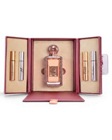 lattafa queen of roses perfume box opened with perfumes bottles inside shows against white background