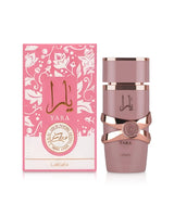 lattafa yara elixir perfume bottle shows beside its box against white background