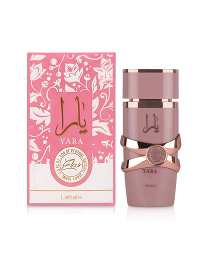 lattafa yara elixir perfume bottle shows beside its box against white background