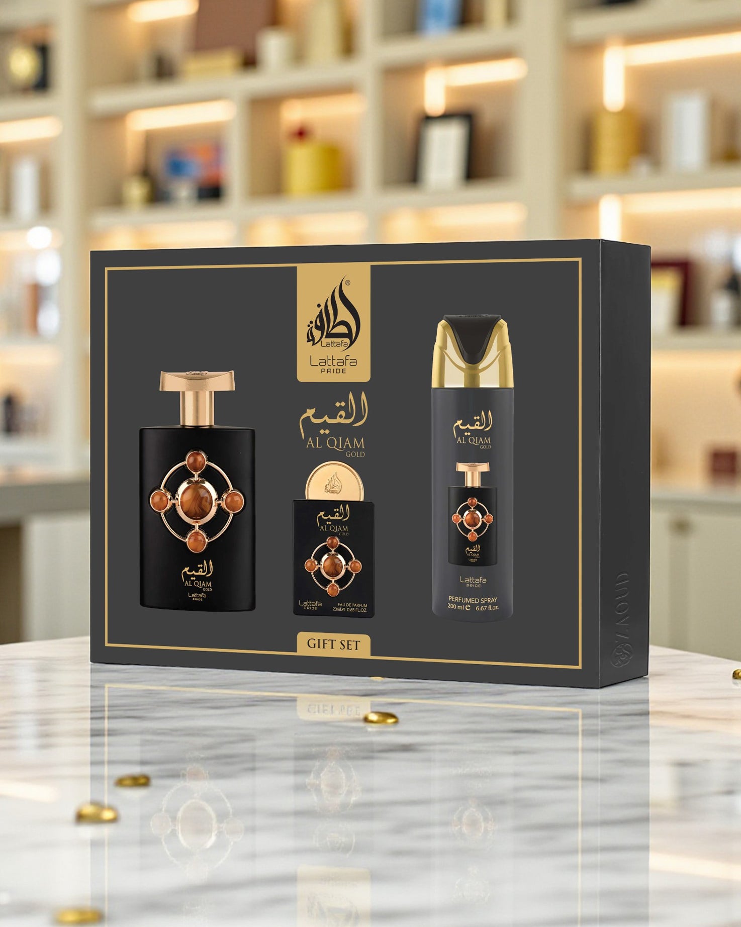 Lattafa al qiam gold gift set with perfume bottles in a decorative box on a marble surface.