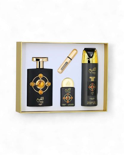 Lattafa al qiam gold gift Set of perfume bottles in a box with gold accents on a white background