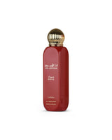 lattafa ana abiyedh rouge all over spray Red perfume bottle with gold cap on a white background