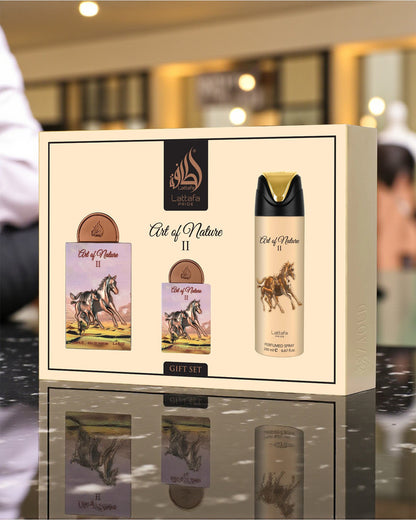 lattafa Art of Nature II gift set with a bottle boxe on a reflective surface.