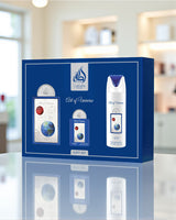 lattafa art of universe gift set packaging on a reflective surface with a blurred indoor background