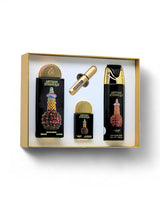 lattafa Artisan ethnique gift set products including a perfume bottle, automizer, and box on a white background