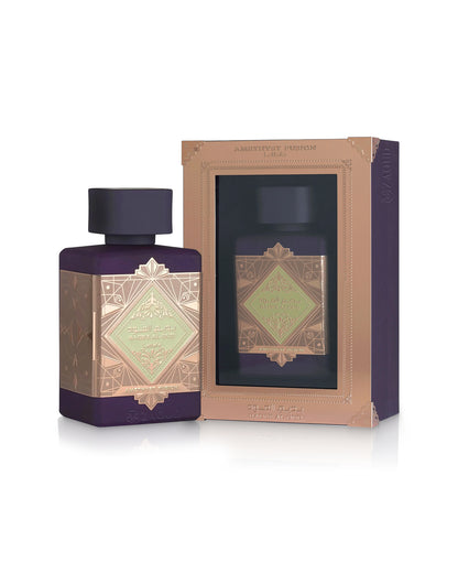 lattafa badee al oud amethyst fusion perfume bottle shows beside its packaging against white background