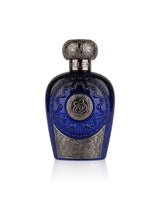 lattafa blue oud elixir perfume bottle shows against white background