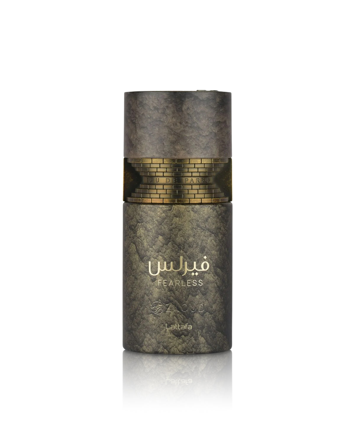 A cylindrical perfume bottle from the brand lattafa, named Fearless, featuring a textured dark gray and gold marble-like design with a gold brick pattern band around the middle and gold Arabic lettering.