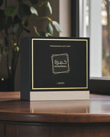lattafa khamrah giftset box shows over wooden table