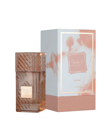 lattafa khamrah mira perfume bottle shows beside ita packaging against white background