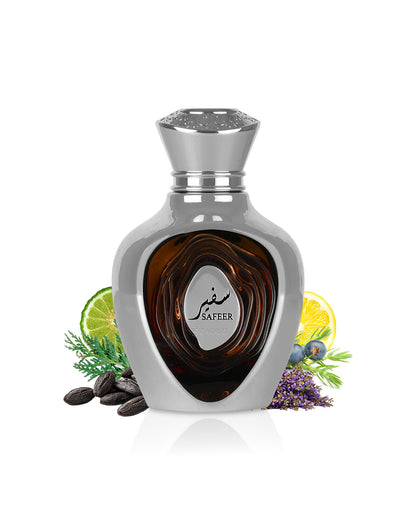 lattafa nich emarati safeer Silver perfume bottle with 'Safeer' branding surrounded by herbs and fruits on a white background