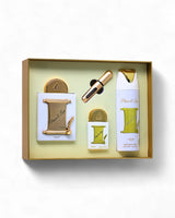 lattafa peace and love gift set including a bottle, a deodorant, and a box with gold accents on a white background.
