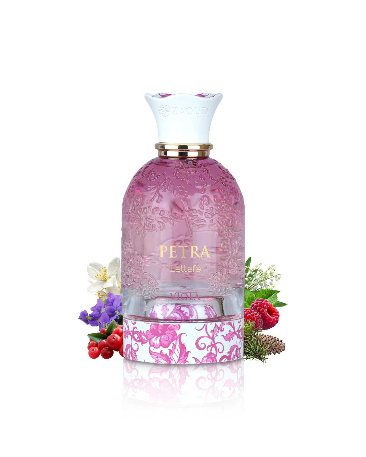 A decorative perfume bottle labeled lattafa PETRA, shown on a clean white background with floral and berry props around the base. The bottle is translucent pink with embossed floral detailing, a white cap with pink accents, and a patterned lower section.