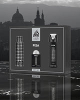 lattafa Pisa gift set packaging with Leaning Tower of Pisa design against a cityscape background
