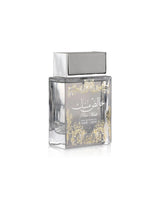 lattafa pure musk perfume bottle with deodorant bottle shows against whithe background
