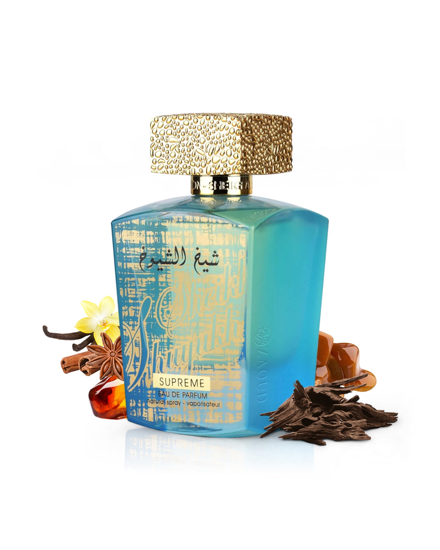 Perfume bottle with gold cap and decorative elements like oud and amber on a white background