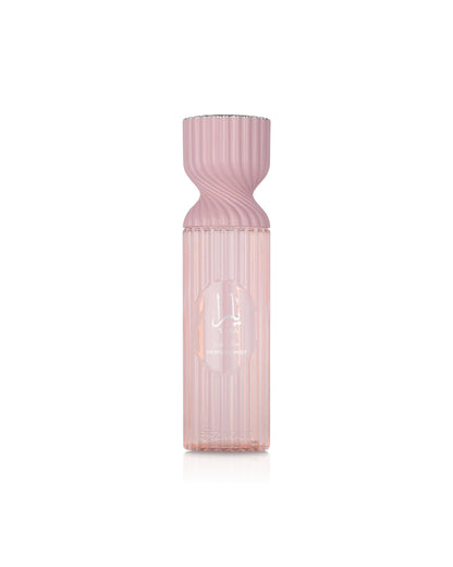 lattafa yara perfume mist Pink ribbed bottle on a white background