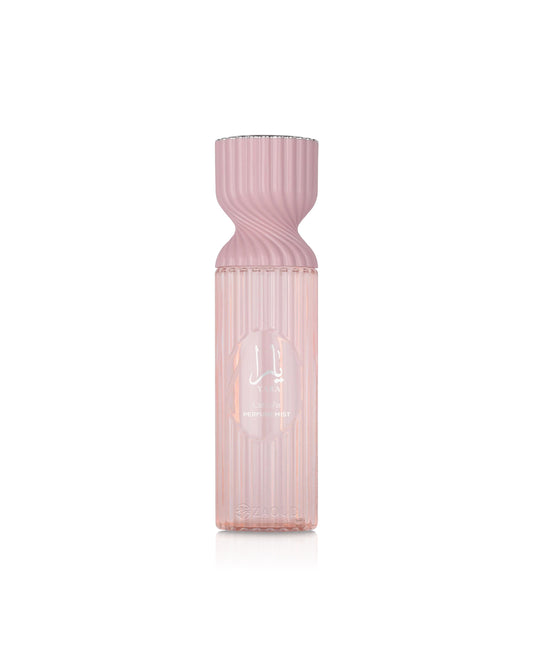 lattafa yara perfume mist Pink ribbed bottle on a white background
