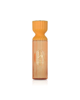 lattafa yara tous perfume mist bottle with a textured design on a white background