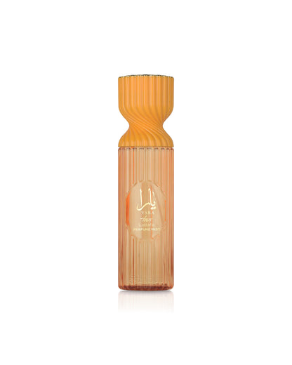 lattafa yara tous perfume mist bottle with a textured design on a white background
