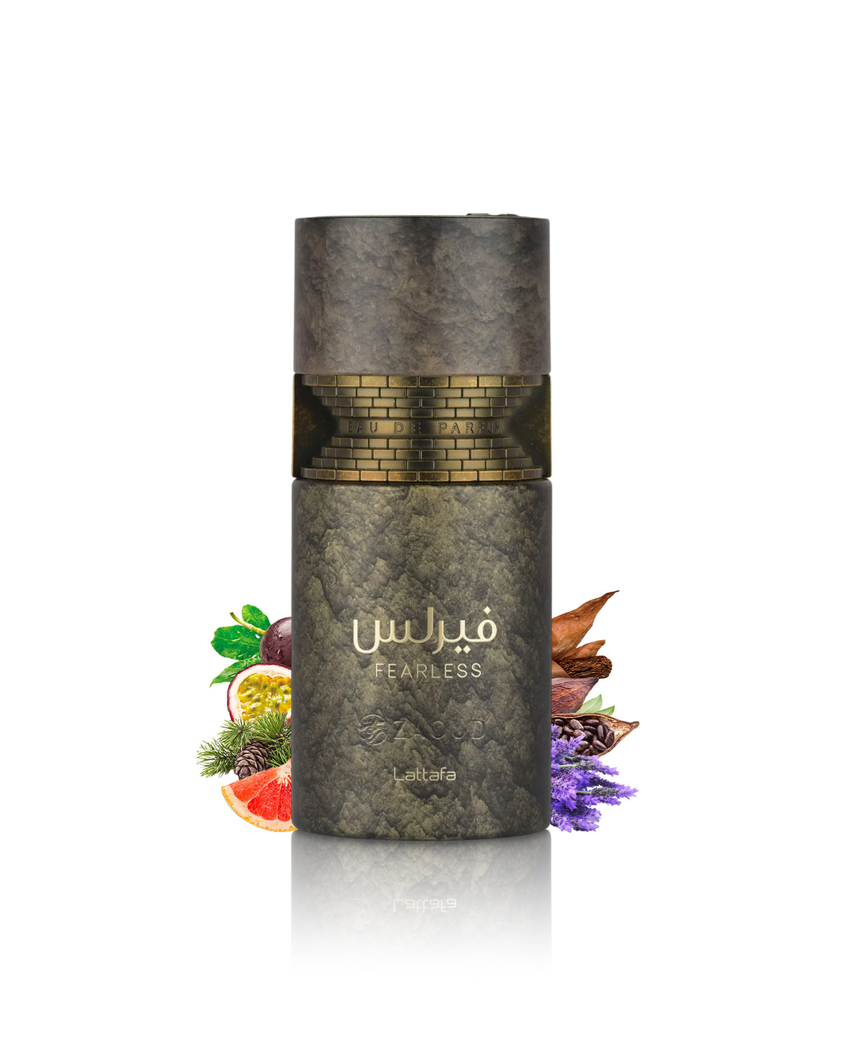 A cylindrical cosmetic bottle labeled 'Fearless' by lattafa, featuring a textured dark gray and gold design with Arabic text. The bottle is centered on a white background with decorative botanical and citrus elements arranged at its base.