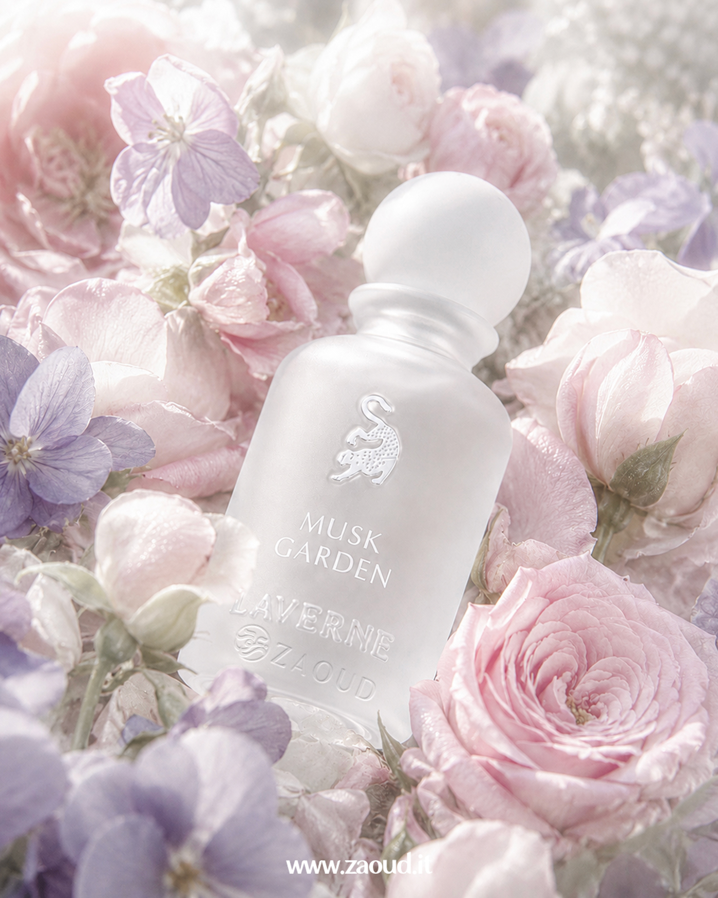 White bottle of Musk Garden L'avenue perfume surrounded by pink and purple flowers