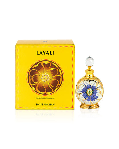 swiss arabian layali perfume oil bottle shows beside its box against white background