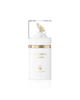 le falcone marbre White candle with gold lid and decorative element on a white background
