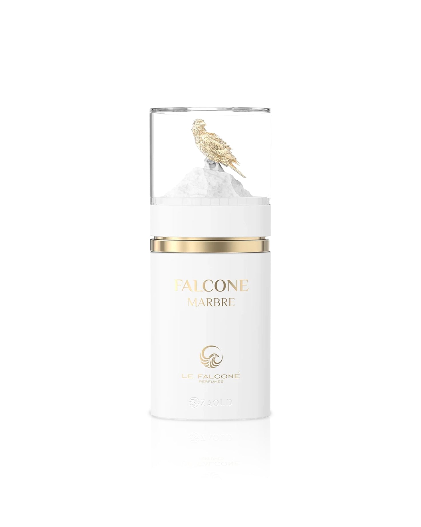 le falcone marbre White candle with gold lid and decorative element on a white background