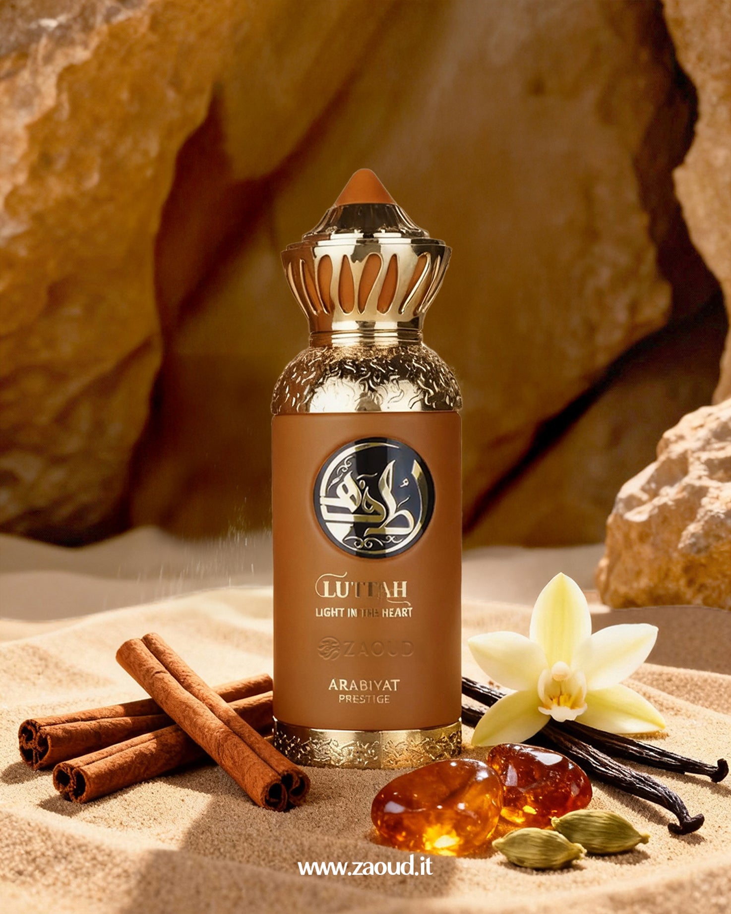 A professional product photograph of a brown perfume bottle, labeled ‘LUTTAH: LIGHT IN THE HEART’ by ARABIYAT PRESTIGE, is set in a desert landscape. The bottle is surrounded by amber, vanilla, and cardamom.