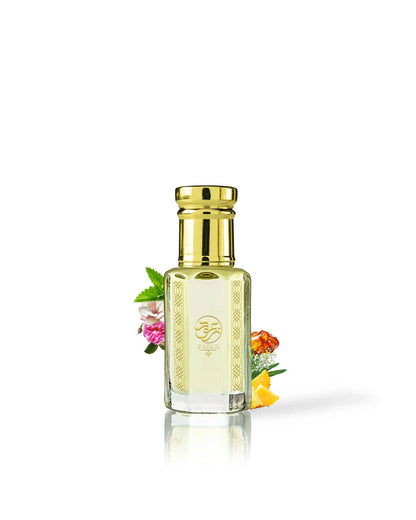 madara blossom madawi perfume oil bottle surrounded with is ingredients like ananas blossom and peony shows from behind the bottle against white background