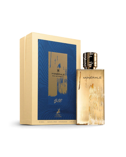 maison alhambra minerale gold perfume bottle shows beside its packaging