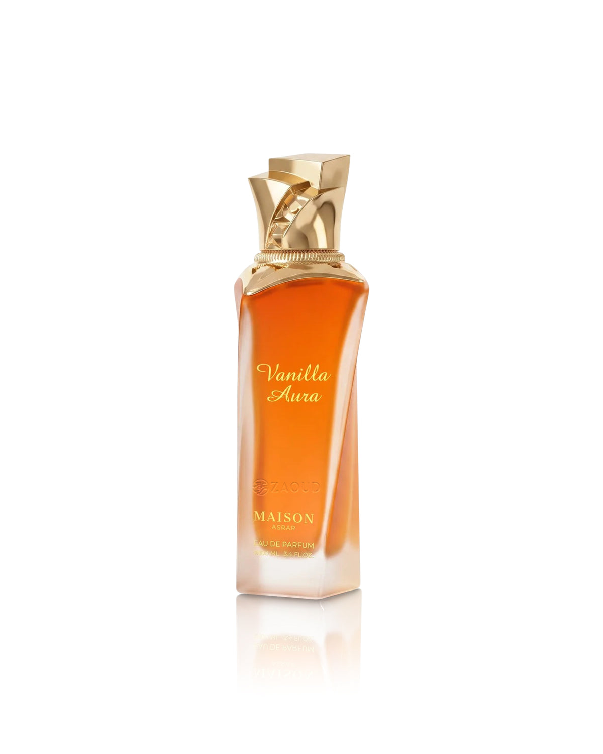 Maison asrar Vanilla Aura Eau de Parfum bottle with amber-orange liquid and a gold cap, shown on a white background with a reflection.