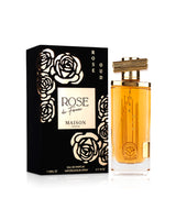maison asrar rose oud perfume bottle shows beside its box against white background