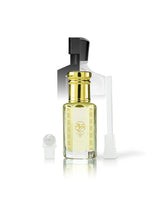majd rouge perfume oil bottle with pale yellow liquid, a shiny gold neck, and a black spray top, shown on a white background with a small white cap and a white applicator wand.