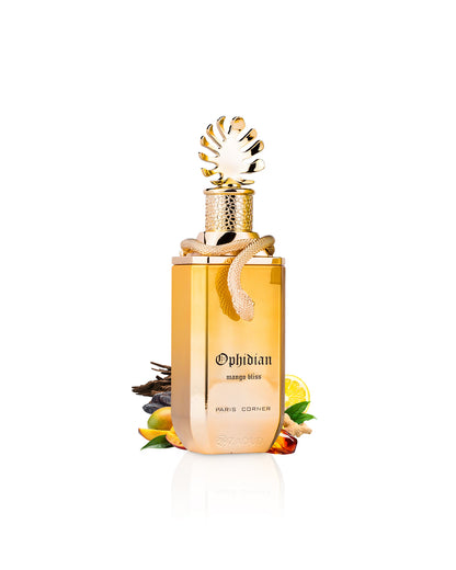 paris corner mango bliss perfume bottle  surrounded with fragrance notes like mango and amber shows from behind the bottle against white background