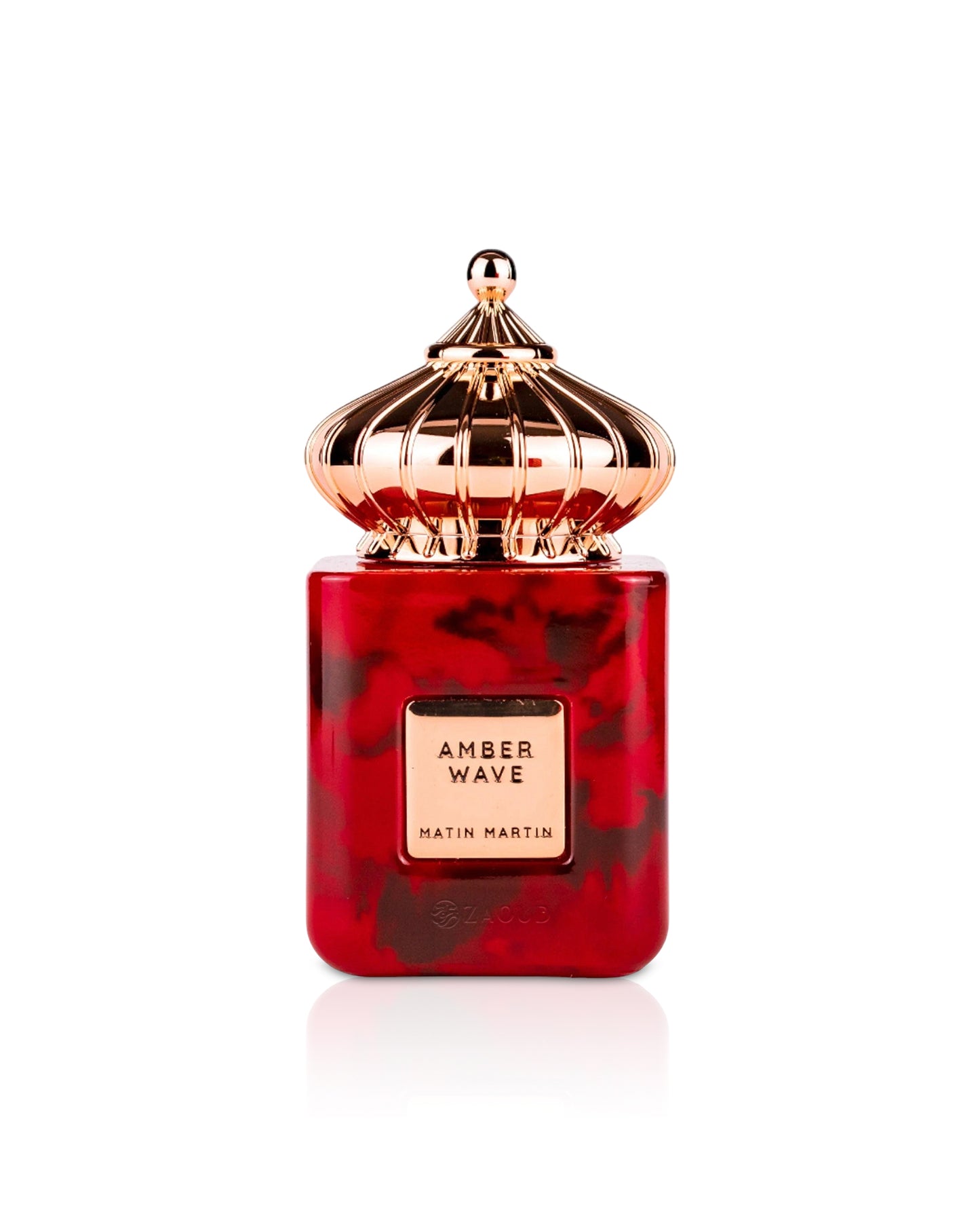 matin martin Red and gold perfume bottle with 'Amber Wave' on a white background