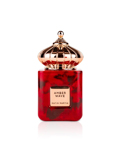 matin martin Red and gold perfume bottle with 'Amber Wave' on a white background
