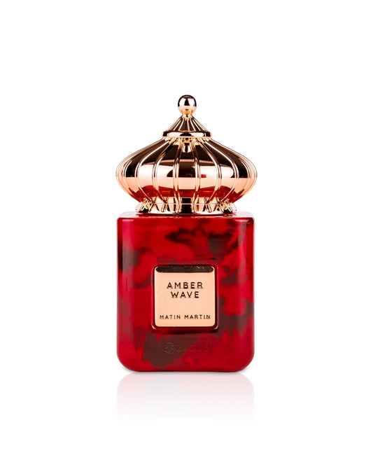 matin martin Red and gold perfume bottle with 'Amber Wave' on a white background