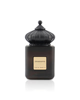 matin martin shahama Black perfume bottle with gold label on a white background