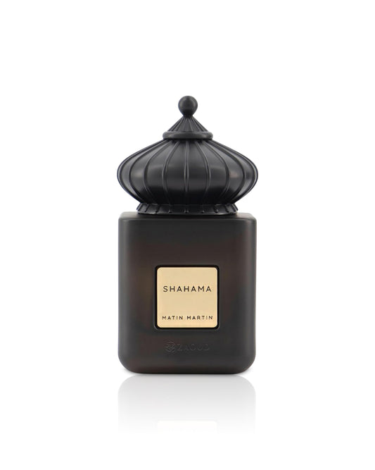 matin martin shahama Black perfume bottle with gold label on a white background