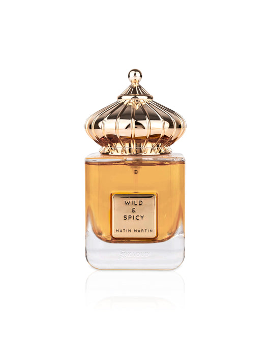 Perfume bottle labeled 'Wild & Spicy' by Matin Martin on a white background