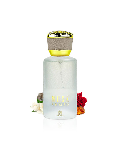 ahmed al maghribi musk ahmed perfume bottle surrounded with fragrance notes like jasmine and rose shows from behind the bottle  against white background