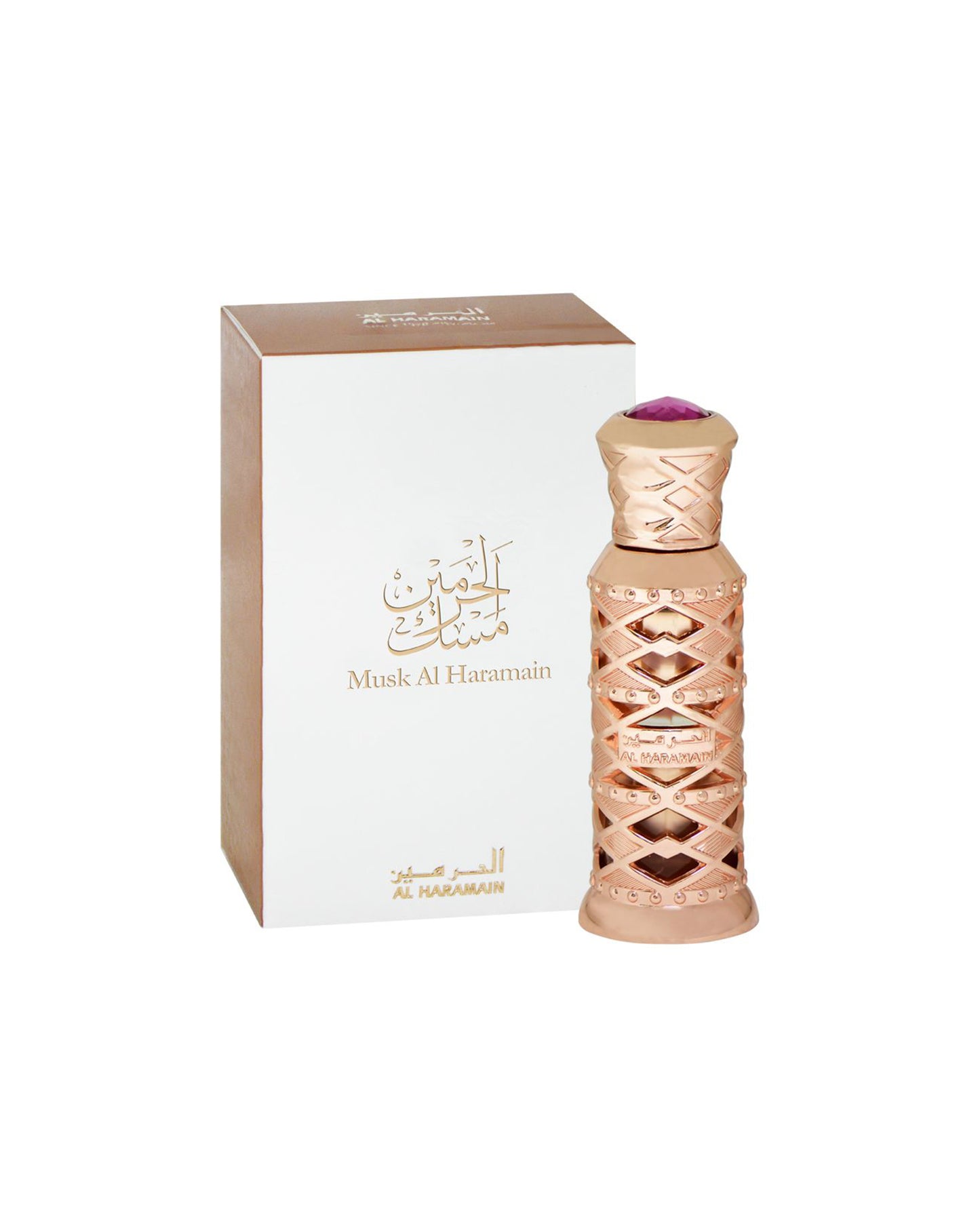 musk al haramain perfume oil bottle shows beside its box against white background