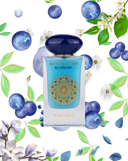 musk-collection-blueberry by gulf orchid perfume bottle photograph between fallen blueberries and flowers