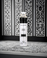 ana abiyedh air freshner bottle photograph against abstract design background