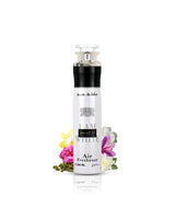 ana abiyedh air freshner bottle surrounded by cardamom saffron against white background