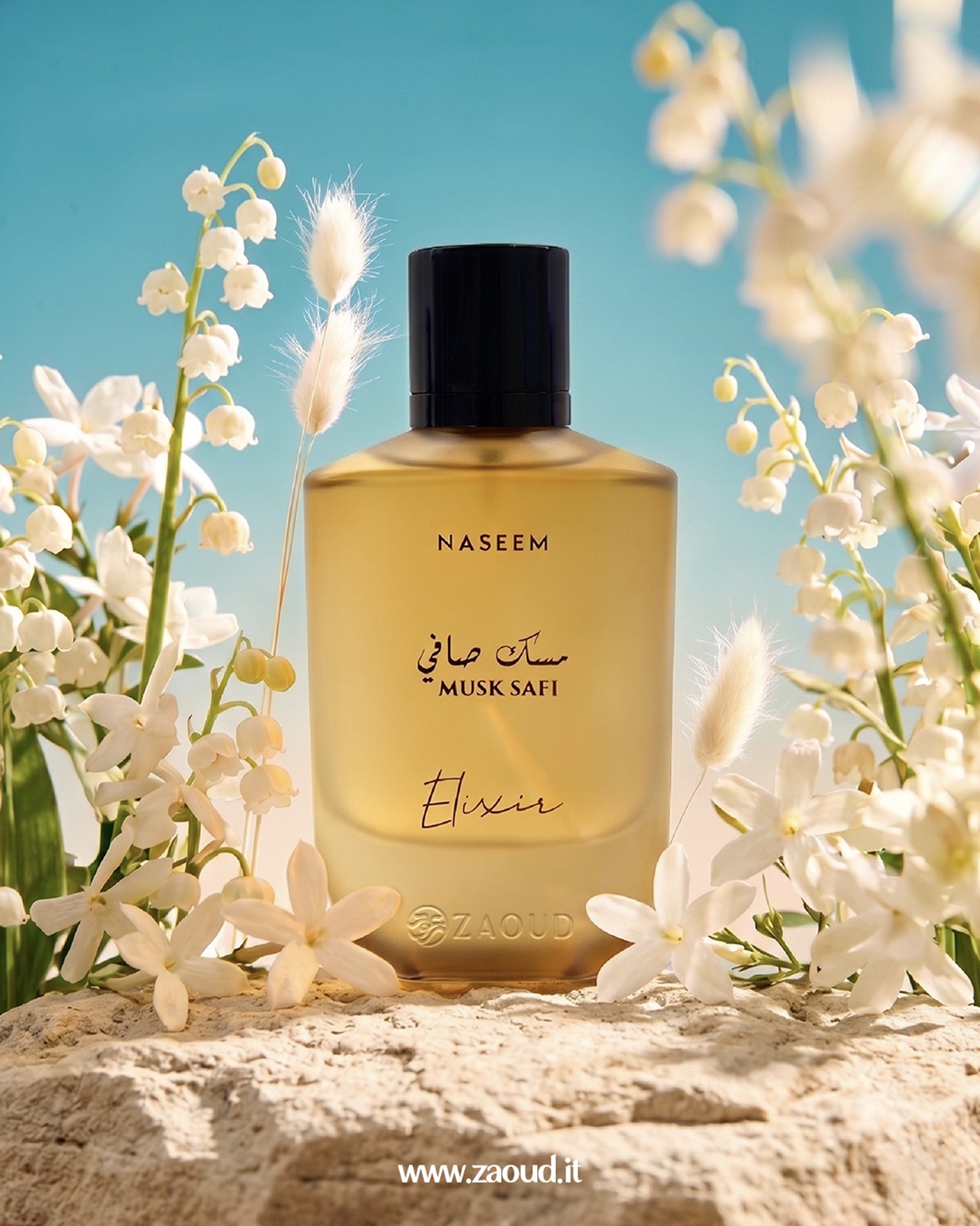 Naseem Musk Safi Elixir perfume bottle surrounded by white flowers with a blue sky background