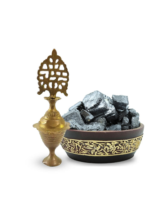 Traditional moroccan Kohl Holder and Kohl Stones in Ornate Bowl on White Background – A Classic Display of Authentic Arabian Makeup Essentials